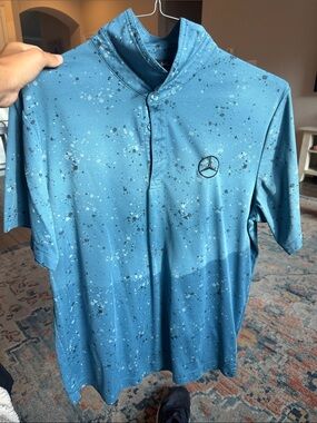 Travis Mathew Teal Blue Splatter Polo with Mercedes Logo